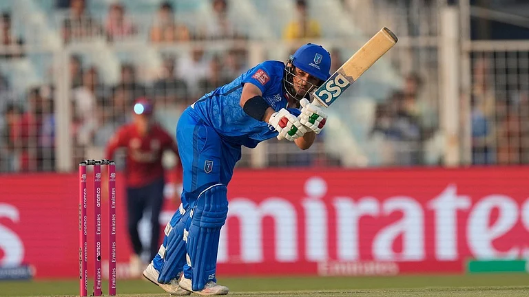 Italy's Justin Mosca plays a shot during the T20 World Cup cricket match between England and Italy in Kolkata, India, Monday, Feb. 16, 2026. - AP Photo/Bikas Das