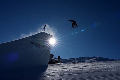Britain's Maisie Hill competes during the women's snowboarding slopestyle qualifications at the 2026 Winter Olympics, in Livigno, Italy.