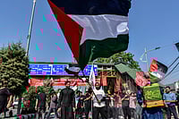 Calls To Review Pro-Palestine Protest Cases Grow In Kashmir IMAGO / SOPA Images : A Kashmiri Shiite Muslim holds a Palestinian flag to express solidarity with Palestinians in Gaza, during a religious procession ahead of Ashura on the eight day of Muharram.