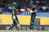 | Photo: AP/Eranga Jayawardena : Australia's Glenn Maxwell, left, and Matthew Renshaw greets each other during the T20 World Cup cricket match between Australia and Zimbabwe in Colombo, Sri Lanka, Friday, Feb. 13, 2026.