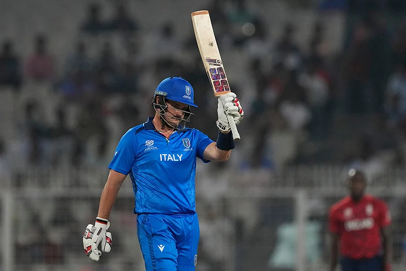 Italys Benjamin Manenti celebrates his fifty runs
