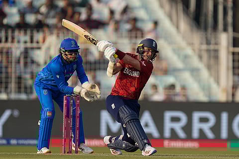 England's Sam Curran hits a six during the T20 World Cup cricket match between England and Italy in Kolkata, India.