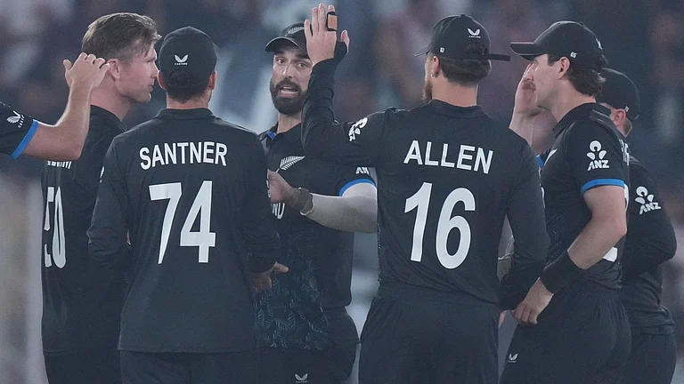 New Zealand's players celebrates the wicket of South Africa's Ryan Rickelton during the T20 World Cup cricket match between South Africa and New Zealand in Ahmedabad , India, Saturday, Feb.14, 2026. - | Photo: AP/Ajit Solanki