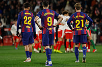 | Photo: AP/Joan MonfortJoan Monfort : Barcelona's Frenkie de Jong, Marc Bernal and Robert Lewandowski react as Girona player celebrate after winning a Spanish La Liga soccer match between Girona and Barcelona in Girona, Spain.