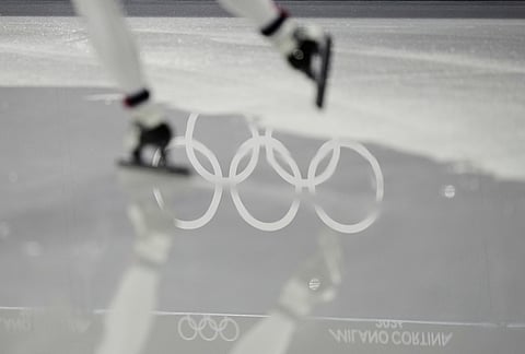 Andrew Heo of the United States warms up for his heat during the men's 500 meter short track speed skating at the 2026 Winter Olympics, in Milan, Italy.