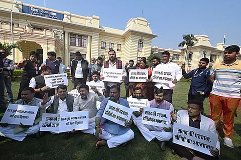 LJP (Ram Vilas) legislators stage a protest outside Bihar Vidhan Sabha during the Budget session of the state Assembly, in Patna.
