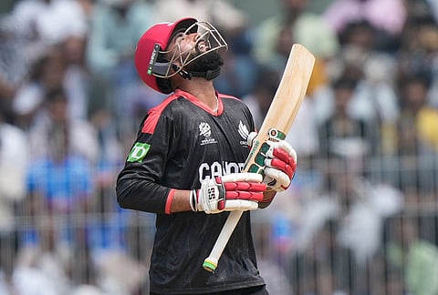 Canada's Yuvraj Samra celebrates his fifty runs during the T20 World Cup cricket match between Canada and New Zealand in Chennai.