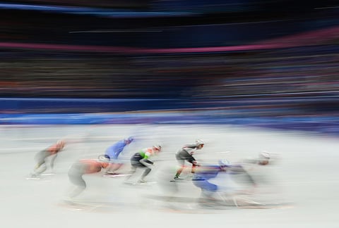 Team China, Team Italy, Team Canada and Team Hungary compete in the men's 5000m relay short track speed skating at the 2026 Winter Olympics, in Milan, Italy.