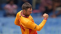| Photo: AP/Eranga Jayawardena : Zimbabwe's Ryan Burl celebrates the wicket of Australia's Glenn Maxwell during the T20 World Cup cricket match between Australia and Zimbabwe in Colombo, Sri Lanka.