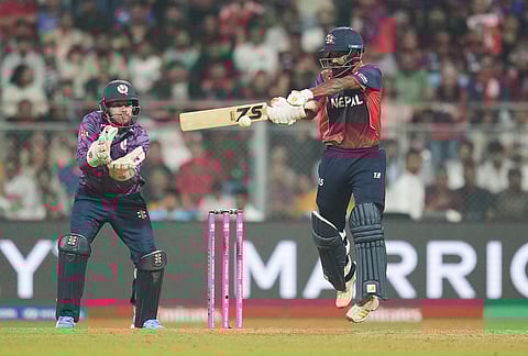 Nepal's Dipendra Singh Airee plays a shot during the T20 World Cup cricket match between Nepal and Scotland in Mumbai.
