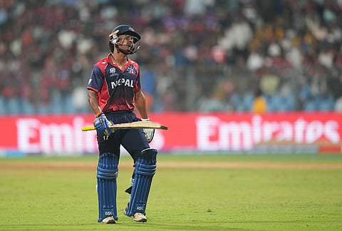 Nepal's captain Rohit Paudel leaves the ground after losing his wicket during the T20 World Cup cricket match between Nepal and Scotland in Mumbai.