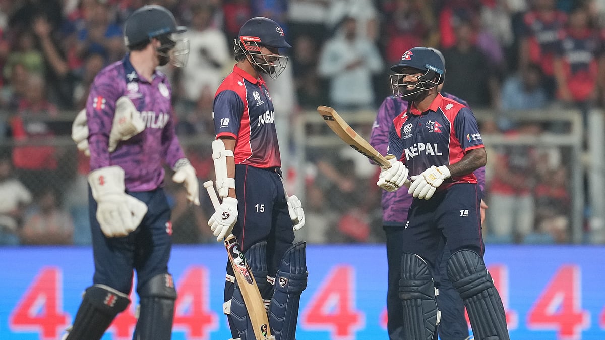 Nepal's Dipendra Singh Airee reacts after hitting a boundary during the T20 World Cup cricket match between Nepal and Scotland in Mumbai, India, Tuesday, Feb. 17, 2026 - (AP Photo/Rafiq Maqbool)qbool