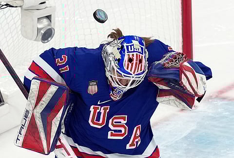 United States goalkeeper Aerin Frankel blocks a shot by Sweden during the second period of a women's ice hockey semifinal match at the 2026 Winter Olympics, in Milan, Italy.