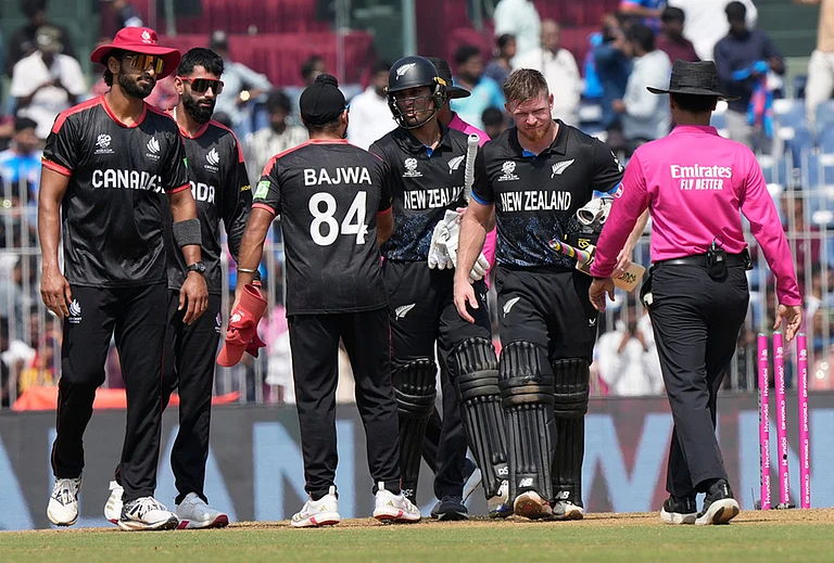 Canada's captain Dilpreet Bajwa, center, shake hands with New Zealand's Rachin Ravindra after New Zealand won the T20 World Cup cricket in Chennai. - | Photo: AP/Mahesh Kumar A.