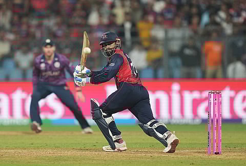 Nepal's Kushal Bhurtel plays a shot during the T20 World Cup cricket match between Nepal and Scotland in Mumbai.