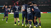 | Photo: AP/Thibault Camus : PSG's Khvicha Kvaratskhelia celebrates with teammates after scoring his side's fourth goal during the French League One soccer match between Paris Saint-Germain and Marseille in Paris.