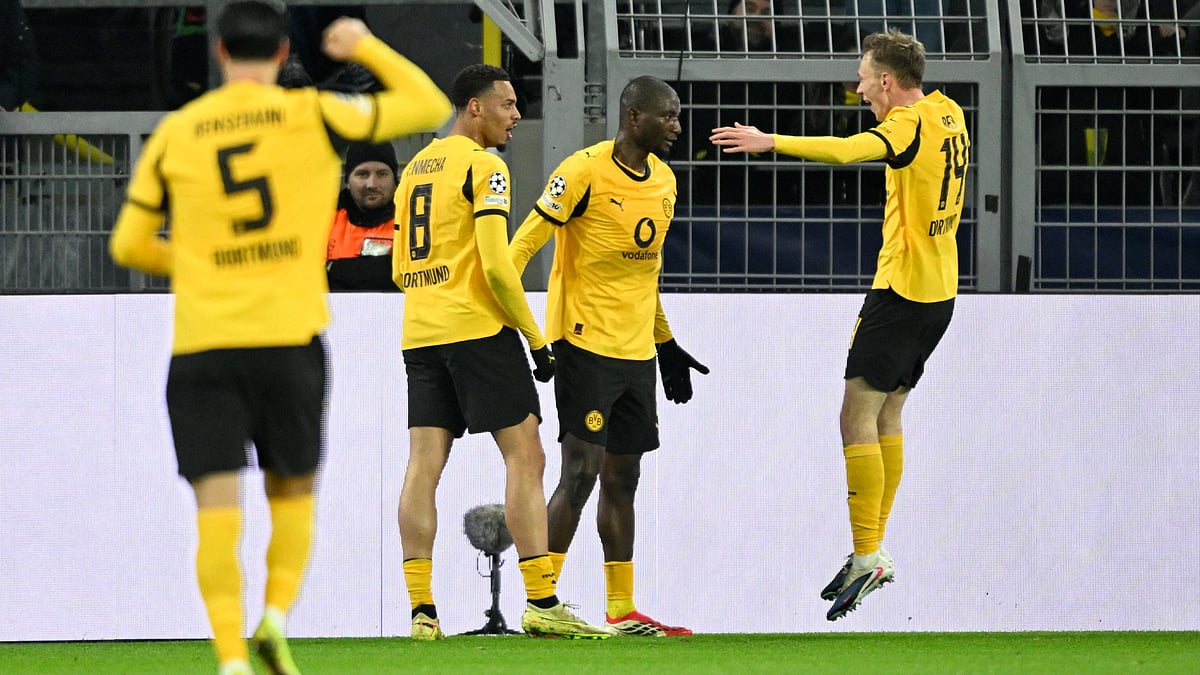 Borussia Dortmund celebrate their second goal against Atalanta - null