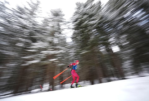 Matthias Riebli, of Switzerland, participates in a biathlon training session at the 2026 Winter Olympics in Anterselva, Italy.