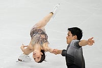 | Photo: AP/Natacha Pisarenko : Riku Miura and Ryuichi Kihara of Japan compete during the pairs figure skating long program at the 2026 Winter Olympics, in Milan, Italy.
