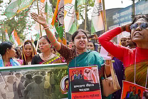 Congress supporters take part in a march as part of the ‘MGNREGA Bachao Sangram’, in Agartala.