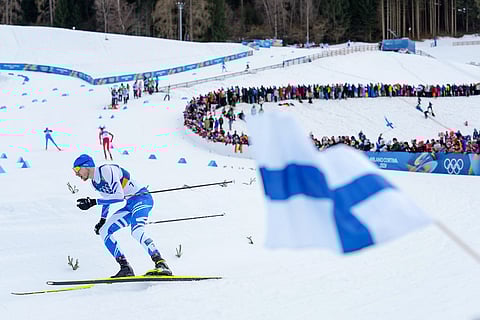 Ilkka Herola, of Finland, competes in the nordic combined individual Gundersen large hill/10km at the 2026 Winter Olympics, in Tesero, Italy
