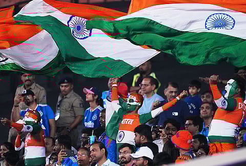 India's fans cheer on from the stands during the T20 World Cup cricket match between India and Netherlands in Ahmedabad.