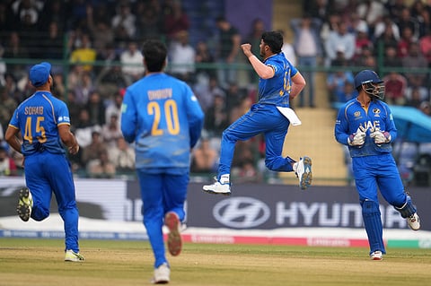 United Arab Emirates' Haider Ali celebrates the wicket of during the ICC T20 World Cup 2026 cricket match between South Africa and United Arab Emirates in New Delhi.
