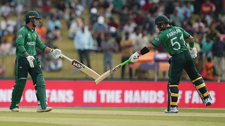 Pakistan's Sahibzada Farhan, right, and Saim Ayub, left, bat during the T20 World Cup match between Namibia and Pakistan in Colombo. - Photo: AP