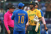 South Africa Vs UAE, ICC T20 World Cup: Bosch, Brevis Help Proteas End Group Stage Campaign With Victory | Photo: AP/Manish Swarup : United Arab Emirates' captain Muhammad Waseem, centre, congratulates South Africa's Jason Smith after South Africa wins the T20 World Cup cricket match between South Africa and United Arab Emirates in New Delhi.