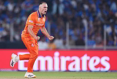 Netherlands' Kyle Klein celebrates the wicket of India's captain Suryakumar Yadav during the T20 World Cup cricket match between India and Netherlands in Ahmedabad.
