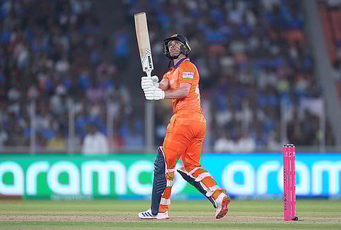 Netherlands' Colin Ackermann plays a shot during the T20 World Cup cricket match between India and Netherlands in Ahmedabad.