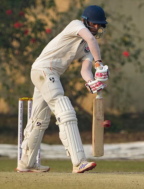 Jammu and Kashmir's Shubham Pundir plays a shot during the third day of the Ranji Trophy semifinal cricket match between Bengal and Jammu and Kashmir, at the Bengal Cricket Academy Ground, in Kalyani, West Bengal.