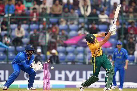 South Africa's captain Aiden Markram bowled out by United Arab Emirates' Haider Ali during the T20 World Cup cricket match between South Africa and United Arab Emirates in New Delhi, India.