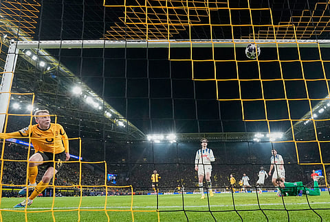 Dortmund's Maximilian Beier scores his side's second goal during the Champions League Knockout playoff 1st leg soccer match between Borussia Dortmund and Atalanta in Dortmund, Germany.