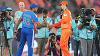 India Vs Netherlands Live Score, ICC T20 World Cup 2026: Dube Goes Berserk, Completes Fifty| IND 159/4 (18) AP Photo : India's captain Suryakumar Yadav and Netherlands' captain Scott Edwards shake hands after the coin toss of the T20 World Cup cricket match between India and Netherlands in Ahmedabad.