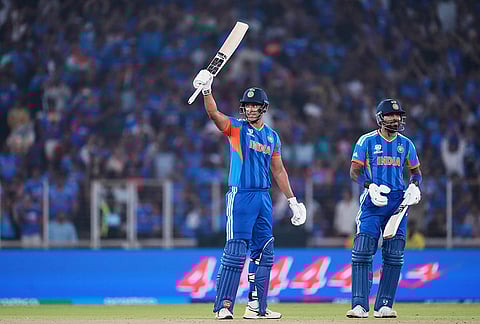India's Shivam Dube, left, celebrates his fifty runs as batting partner Hardik Pandya applauds during the T20 World Cup cricket match between India and Netherlands in Ahmedabad.