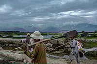 Illegal Riverbed Mining Takes A Toll On Livelihoods In Kashmir IMAGO / Middle East Images : Sand Mining in India Workers carry their tools to mine sand from the Asia s biggest sweet water lake Wular at dawn in Bandipora, India-administered Jammu and Kashmir, on Monday July 14, 2025.