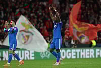 | Photoz: AP/Pedro Rocha : Real Madrid's Vinícius Júnior reacts at the end of a Champions League playoff soccer match between Benfica and Real Madrid in Lisbon, Portugal.