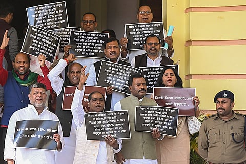 RJD and CPI (M) legislators stage a protest over various issues during the Budget session of the Bihar Assembly, in Patna.