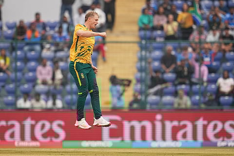 South Africa's Corbin Bosch celebrates the wicket of United Arab Emirates' Sohaib Khan during the T20 World Cup cricket match between South Africa and United Arab Emirates in New Delhi, India.