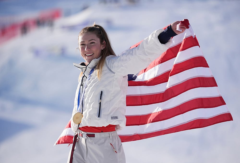 | Photo: AP/Jacquelyn Martin : United States' Mikaela Shiffrin celebrates winning the gold medal in an alpine ski, women's slalom race, at the 2026 Winter Olympics, in Cortina d'Ampezzo, Italy.