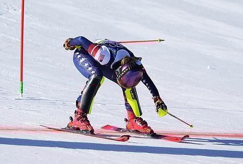 United States' Mikaela Shiffrin crosses the finish line to win an alpine ski, women's slalom race, at the 2026 Winter Olympics, in Cortina d'Ampezzo, Italy.