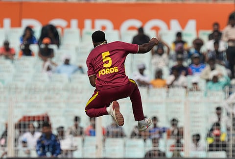 West Indies' Matthew Forde celebrates the wicket of Italy's Justin Mosca during the T20 World Cup cricket match between West Indies and Italy in Kolkata.