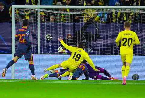 Bodø/Glimt's Sondre Brunstad Fet (19) scores against Inter Milan during a Champions League soccer match in Bodo, Norway.