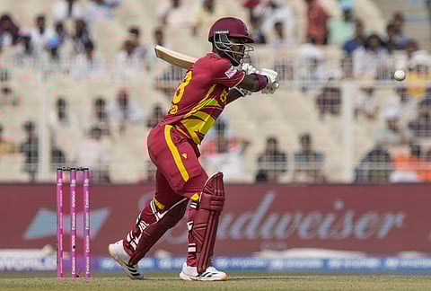 West Indies' Sherfane Rutherford plays a shot during the T20 World Cup cricket match between West Indies and Italy in Kolkata.