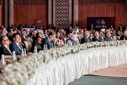 Prime Minister Narendra Modi with world leaders during the AI Impact Summit, in New Delhi. 