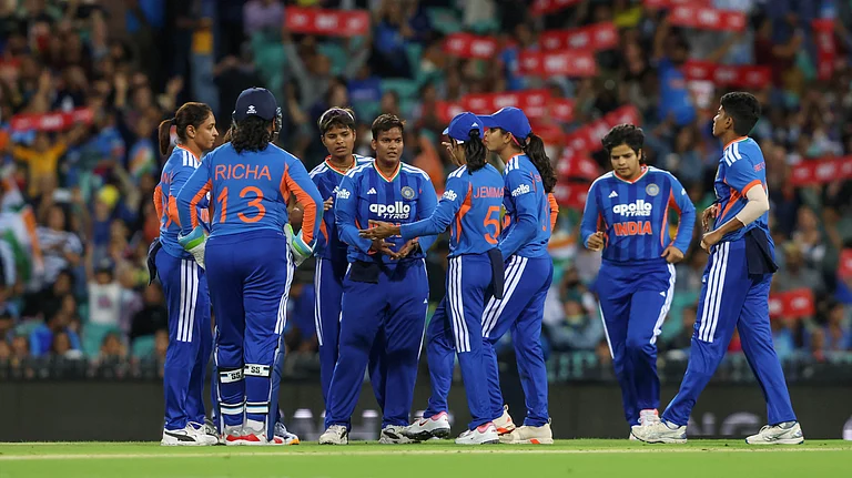 India Women's team cricketers in action against Australia Women in the 1st T20I at Sydney. - BCCIWomen/X