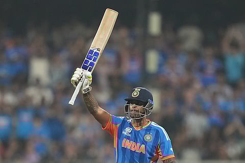 India's captain Suryakumar Yadav celebrates his fifty runs during the T20 World Cup cricket match between India and the United States in Mumbai.