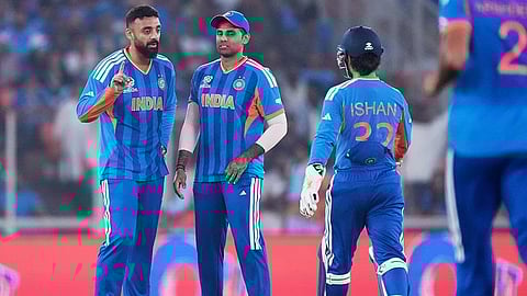 India's Varun Chakravarthy, left, celebrates with teammates the wicket of Netherlands' Max O'Dowd during the T20 World Cup cricket match between India and Netherlands in Ahmedabad.