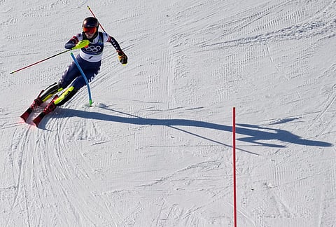 United States' Mikaela Shiffrin on her way to winning an alpine ski, women's slalom race, at the 2026 Winter Olympics, in Cortina d'Ampezzo, Italy.